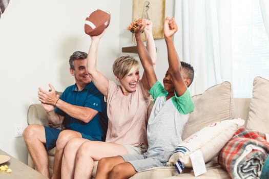 family celebrating a fantasy football victory